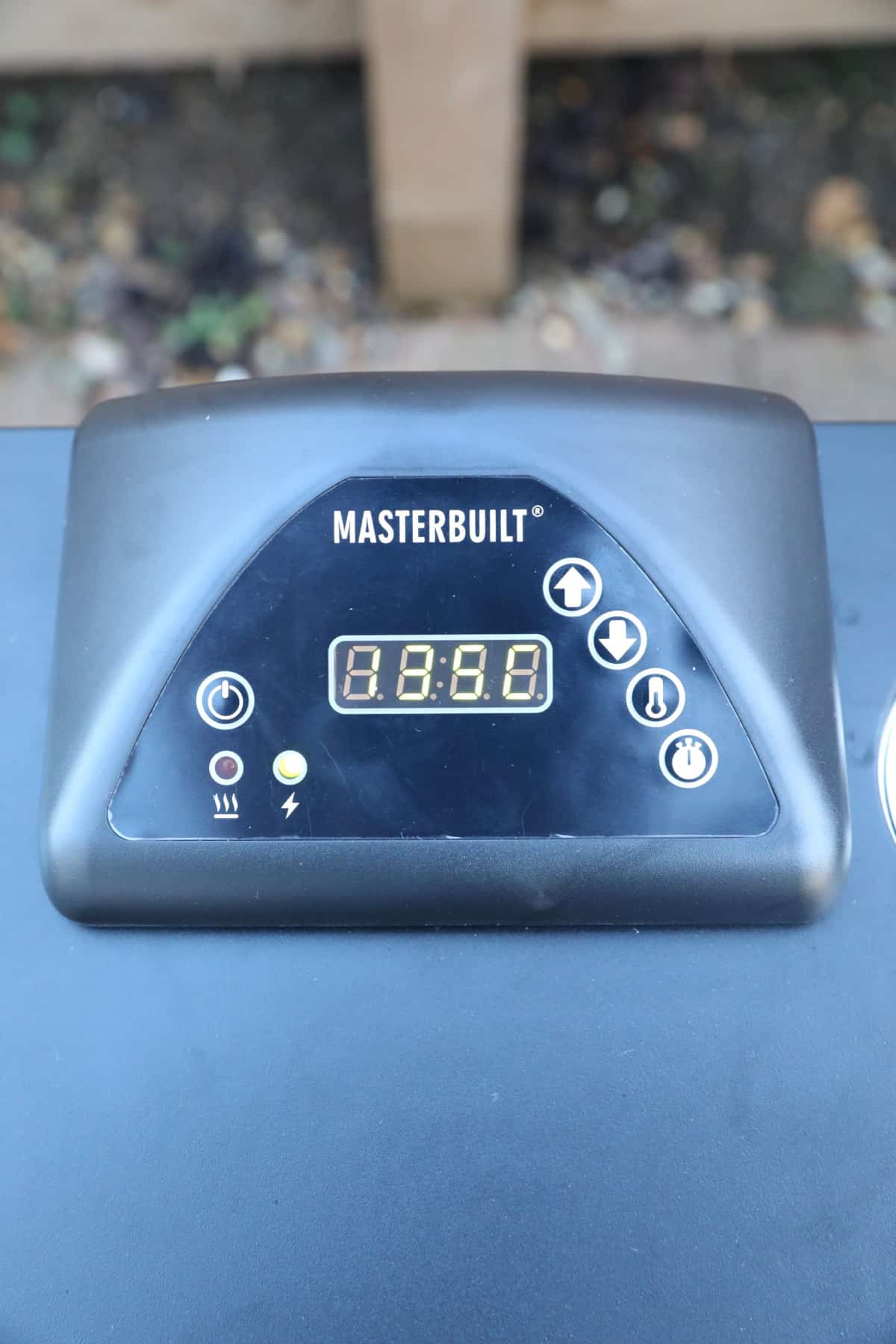 Close up of Masterbuilt electric smoker top controller.