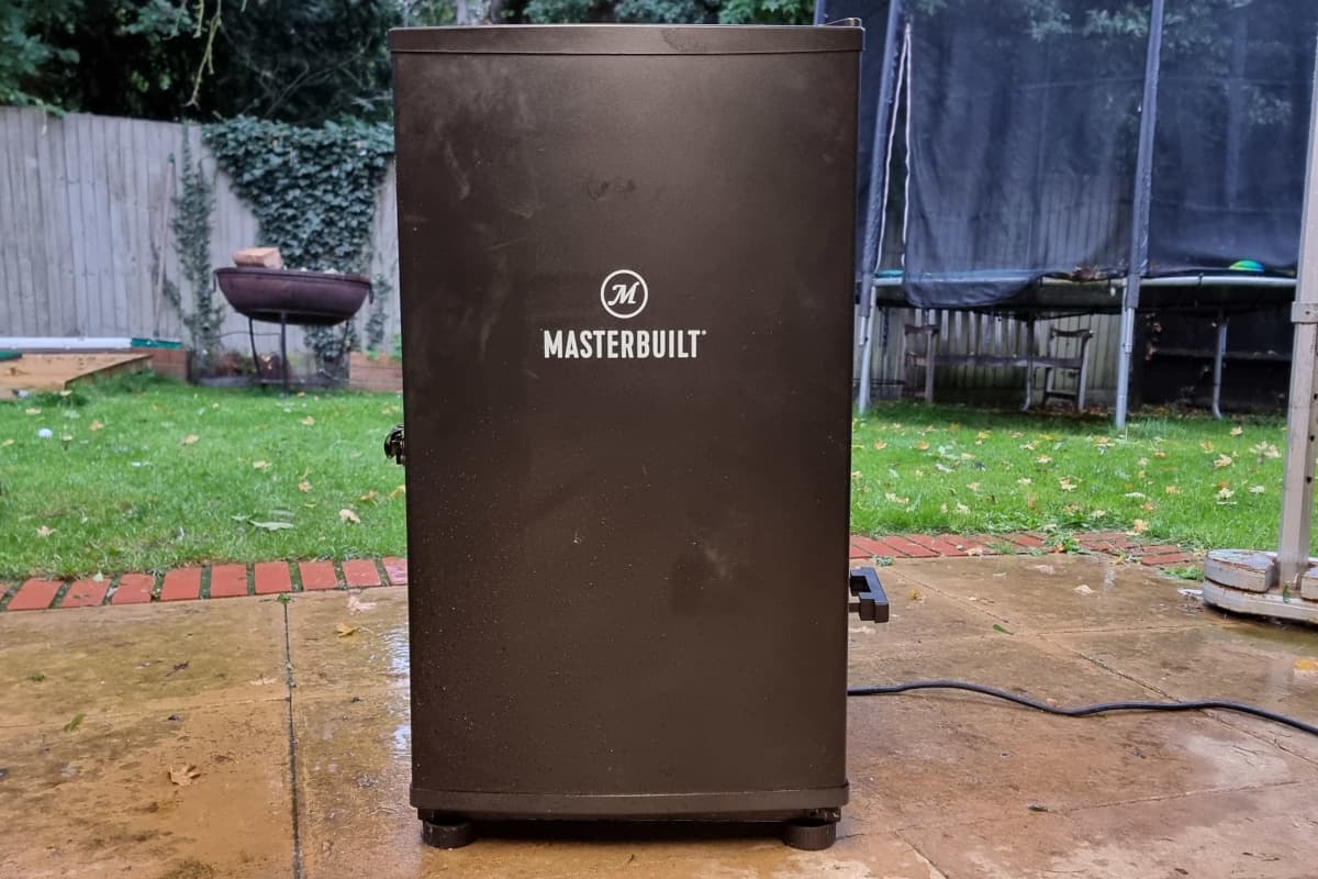 masterbuilt 30 electric smoker on a slabbed patio.