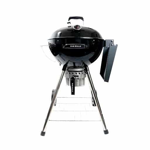 Slow N Sear Kettle Grill isolated on white.