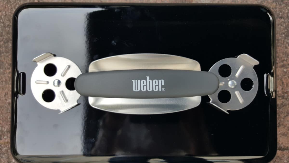 Close up of the Weber Go Anywhere lid, handle, and top vents