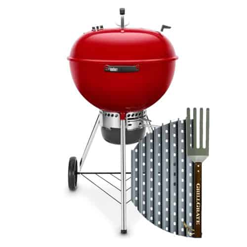 A half moon grill grate in front of a red Weber Kettle grill, isolated on white.