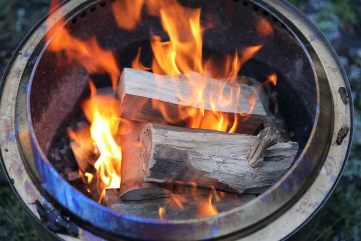 A wood fire raging in a Solo Stove Bonfire.