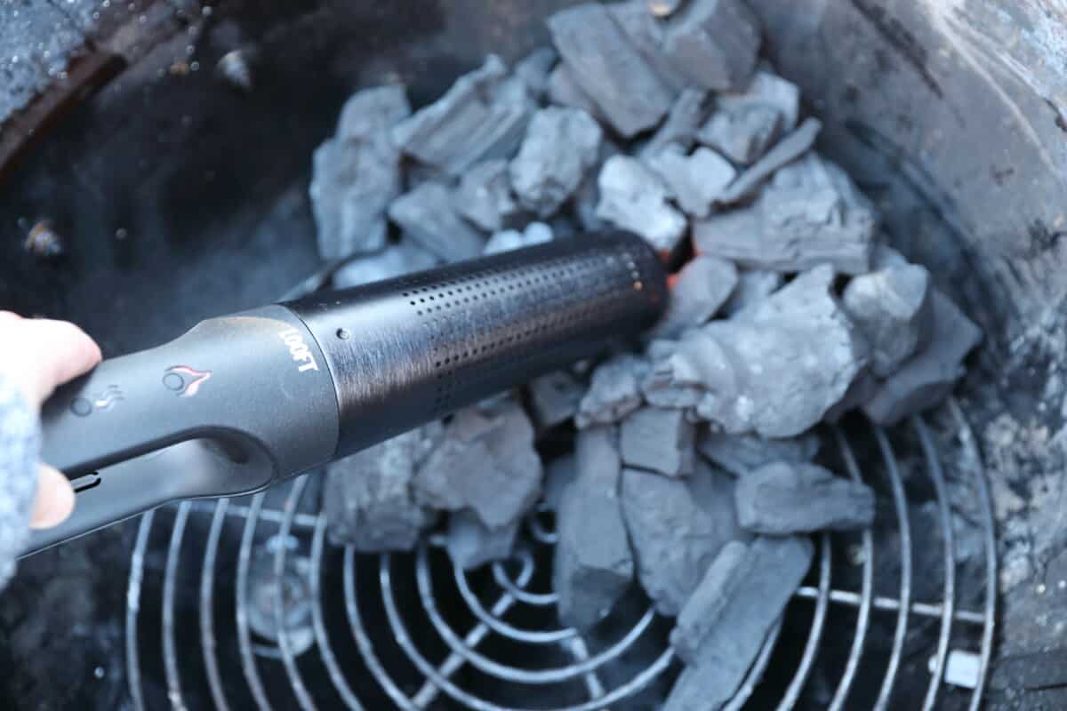 Starting a charcoal fire with a Looft Lighter X.