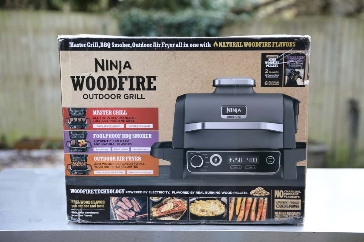 Ninja Woodfire box on a stainless steel table.