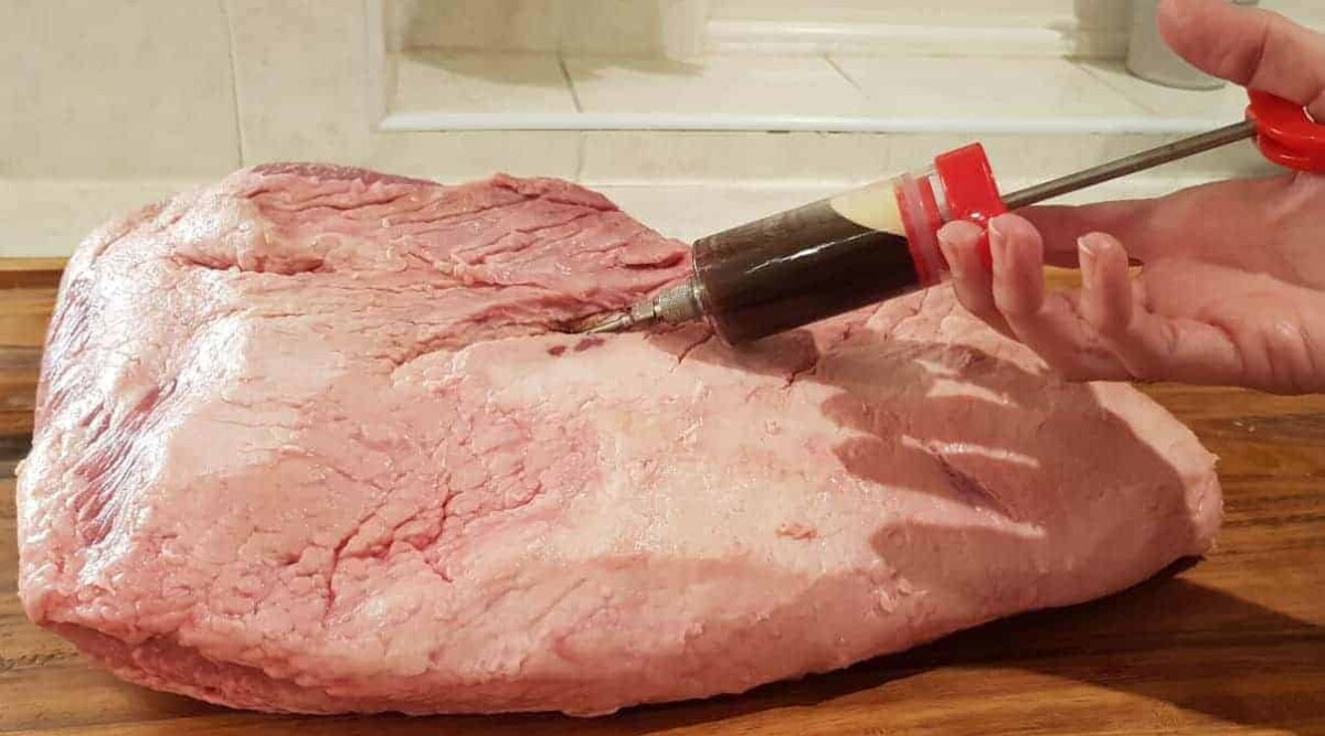 Close up shot of a brisket injection.